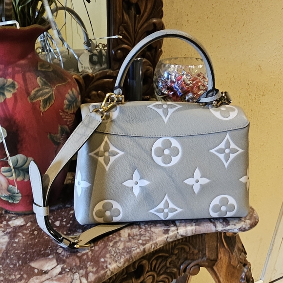 Louis Vuitton Empreinte Monogram Giant Madeline MM in Dove Grey - Picture 10 of 16